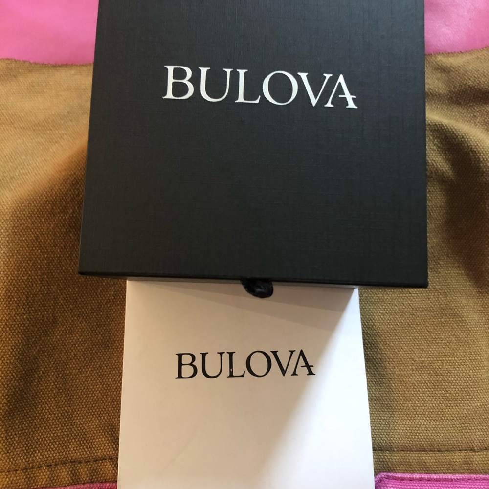 Bulova Watch NWT- Diamonds silver band black head